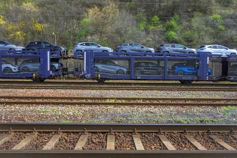Autorack with new cars for export. Stock Photos