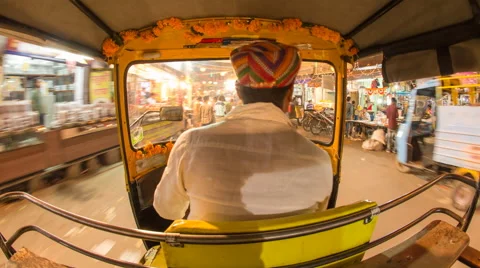 Autorickshaw POV busy illuminated old city streets, Udaipur, Rajasthan, India Stock Footage