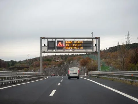 Autostrada A4 variable message sign displaying road works warning near Lise.. 스톡 사진
