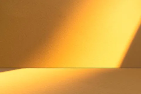 Autumn background yellow beige studio room abstract shadow on wall floor Fotos Stock
