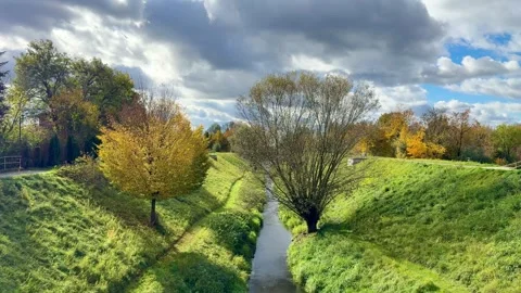 Autumn Canal Landscape With Dramatic Clouds Video stock 320831347