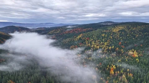 Autumn clouds drift, Diffuse light shrouds mountain and valley Stock Footage 320655388