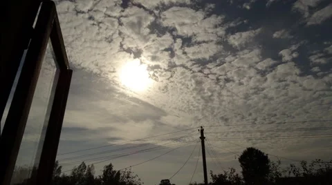 Autumn clouds moving timelapse through window. 4K Stock Footage 56174445