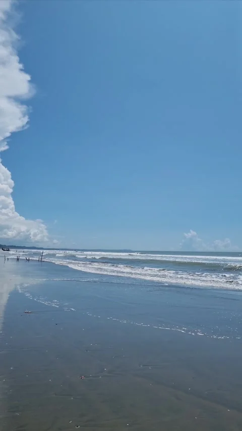 Autumn Clouds Over a Calm Ocean on a Sunny Day Stock Footage 303909516