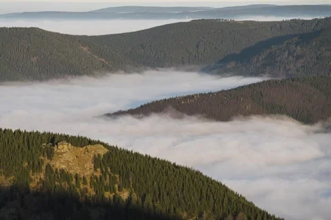 Autumn clouds rolling in valley 8K Stock Footage 243488067
