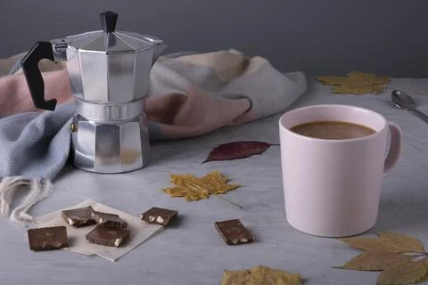 Autumn composition of coffee served in a ceramic mug Stock Photos
