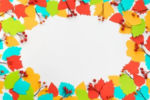 Autumn composition frame Paper colored leaves branches berries on white backg Stock Photos