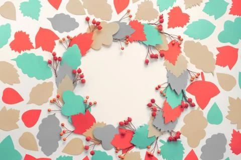 Autumn composition frame Paper colored leaves branches berries on white backg Stock Photos
