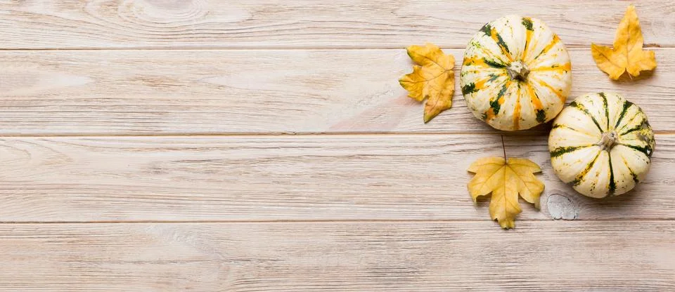 Autumn composition. Pattern made of dried leaves and other design accessories Stock Photos