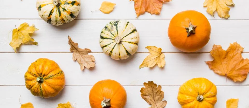 Autumn composition. Pattern made of dried leaves and other design accessories Stock Photos