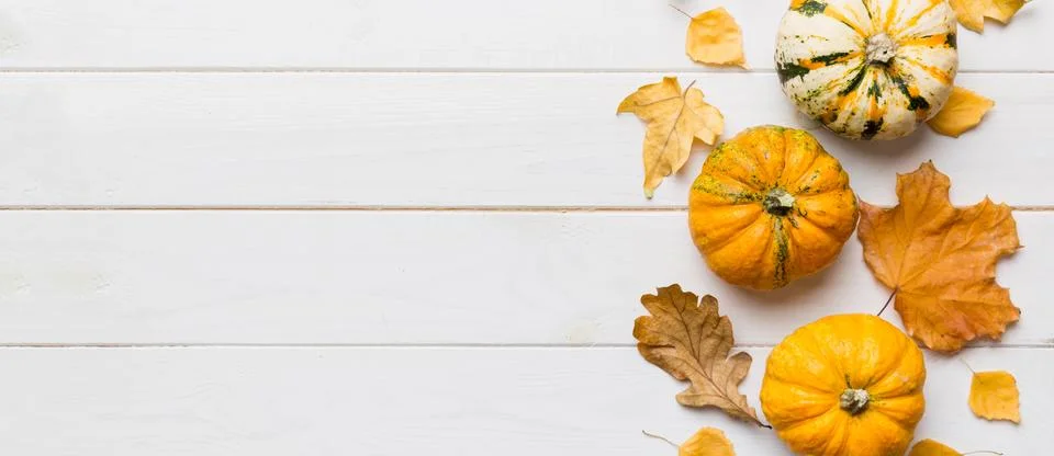 Autumn composition. Pattern made of dried leaves and other design accessori.. Stock Photos