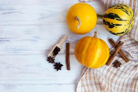 Autumn composition with pumpkin, cinnamon and anise stars. Stock Photos