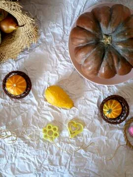 Autumn composition of pumpkins, pears, decor, leaves Stock Photos