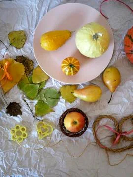 Autumn composition of pumpkins, pears, decor, leaves Stock Photos