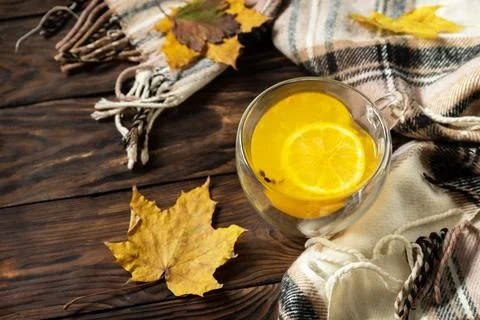 Autumn concept with drink, creative flat lay. Cup of hot sea ????buckthorn .. Stock Photos