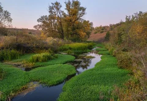 Autumn evening on the river Stock Photos