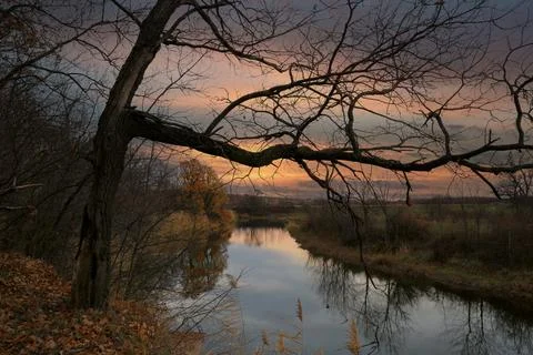 Autumn evening scene on river Stock Photos