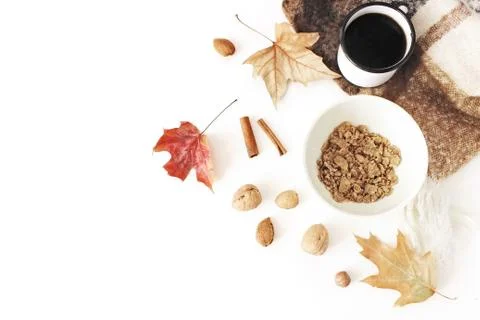 Autumn, fall breakfast composition. Cup of coffee, bowl of oat flakes, muesli 写真素材