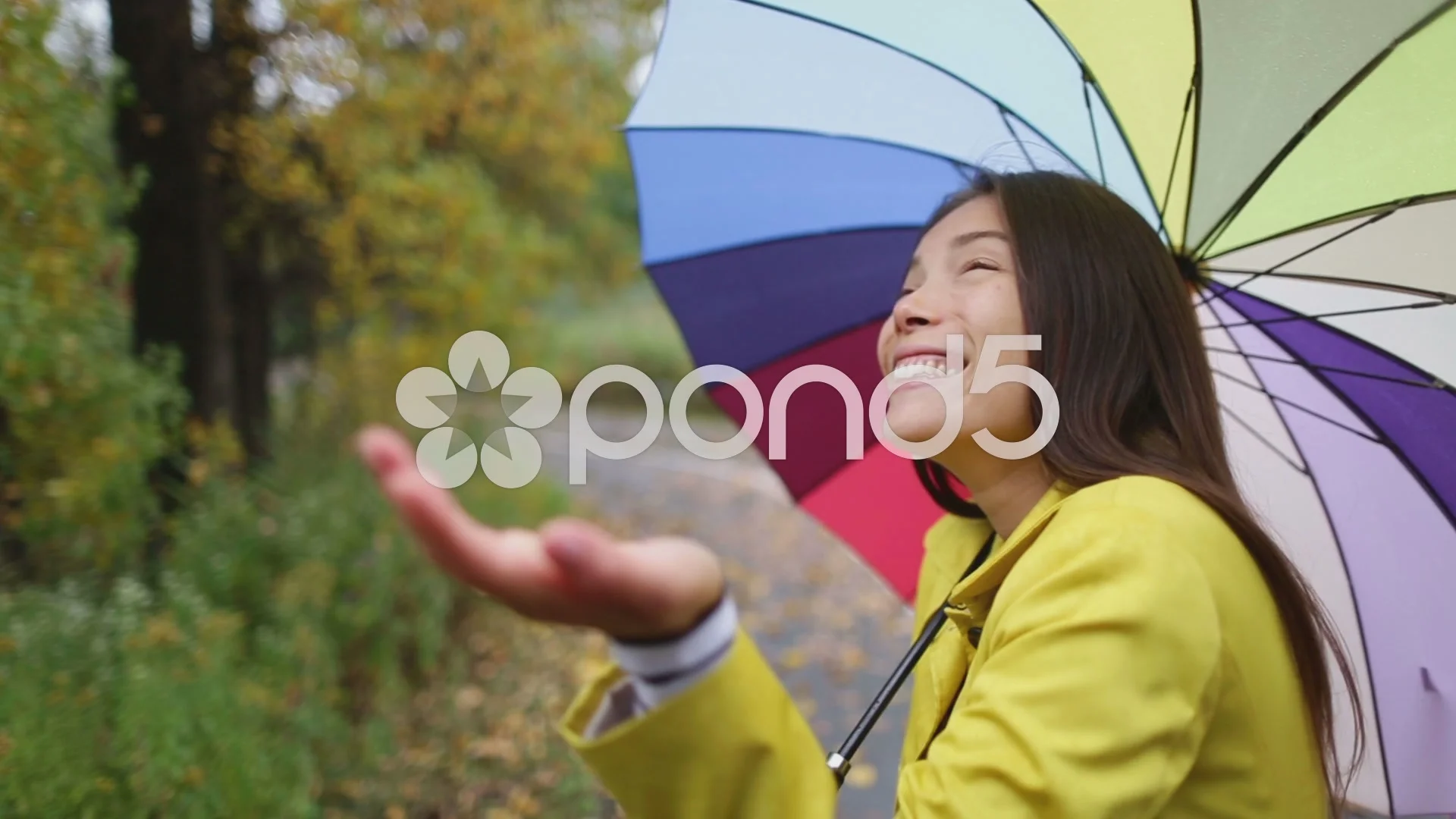 Autumn / fall woman happy in rain with u... | Stock Video | Pond5