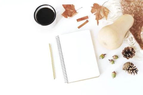 Autumn, fall workspace composition. Notebook mock-up scene. Cup of coffee, wool Fotos Stock