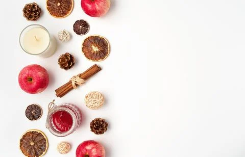Autumn flat lay composition of apples, fall foods and decor on white background Stock Photos