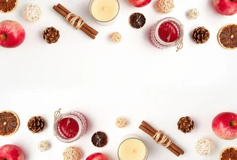 Autumn flat lay composition of apples, fall foods and decor on white background Stock Photos