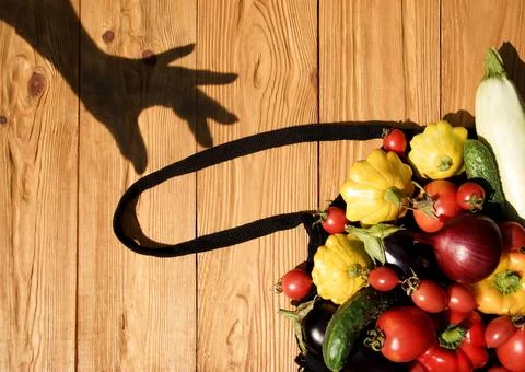 Autumn harvest of vegetables in a mesh bag Stock Photos