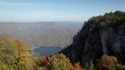 Autumn Lake Reflections in Mountains Stock Footage 289012088