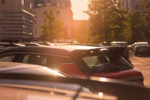 Autumn landscape and view of the road with cars. Orange evening sun Stock Photos