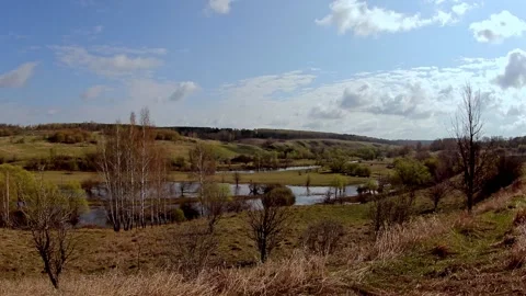 Autumn landscape with floating clouds across the sky in national park. Timelapse Video stock 169704527