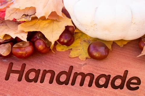 Autumn leaves, objects with Handmade text. Natural patterns, color design. Stock Photos