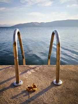 Autumn leaves on the stairs to Sevan Lake, Armenia Stock Photos