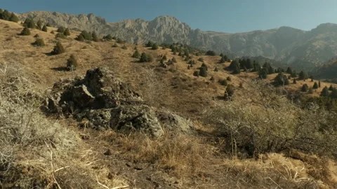 Autumn mountain scenery. The camera is approaching the edge of a cliff. Stock Footage 164275997