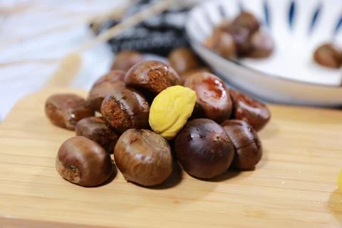 Autumn nut-like fruit chestnut Stock Photos