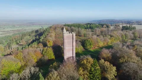 Autumn over Alfred's Tower from a drone, Stourhead, Somerset, England Video stock 292364691