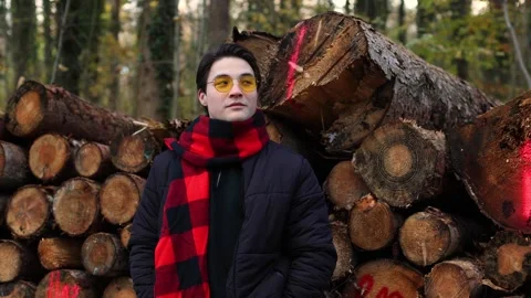 Autumn park nature confident friendly happy Caucasian posing looking at camera 動画素材 262777041