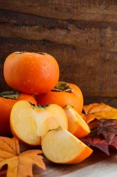 Autumn persimmon fruit Stock Photos