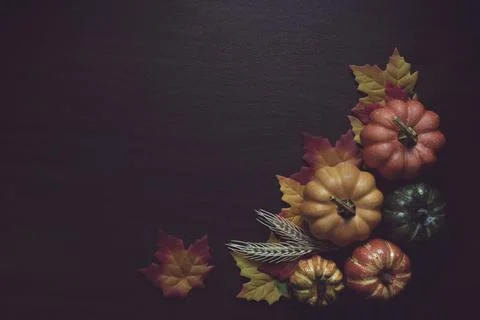 Autumn pumpkin and fall colored leaves. Foto stock