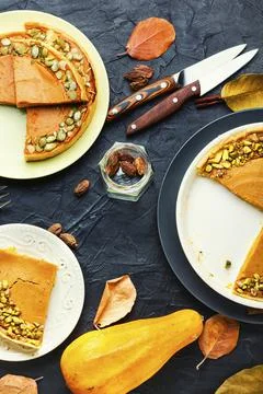 Autumn pumpkin pie on a plate Stock Photos