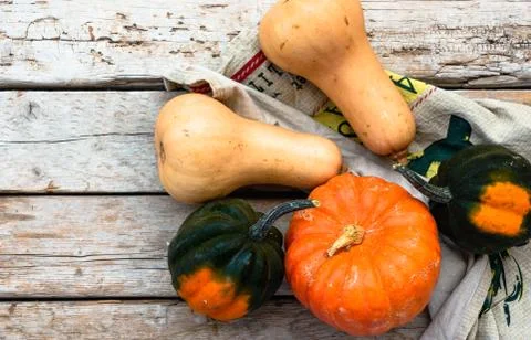 Autumn pumpkins patch still life on a wooden background. Rustic style Stock-Fotos