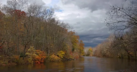 Autumn River with Dark Clouds and Shadows, static shot Stock Footage 66906965