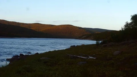 Autumn river, Time lapse view of tenojoki river at the border between norway  Stock Footage 82117715