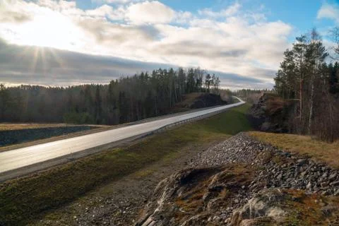Autumn Sunny landscape of the highway A-121 Sortavala in Karelia. Russia. Stock Photos