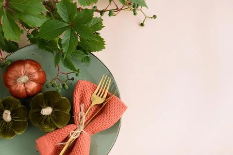 Autumn Table Setting With Decorative Pumpkins Orange Napkin And Gold Cutler.. Stock Photos
