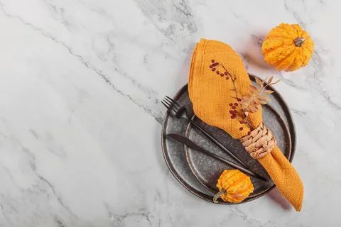Autumn table setting with pumpkin decorations Stock Photos