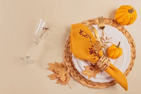 Autumn table setting with pumpkin decorations Stock Photos