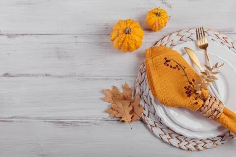 Autumn table setting with pumpkin decorations Stock Photos