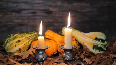 Autumn table setting with pumpkins and candles, fall home decoration for festive Stock Footage 83739296