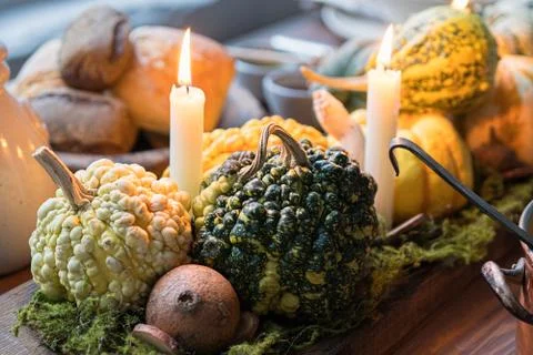 Autumn table setting with pumpkins. Thanksgiving dinner and fall decoration. Stock Photos