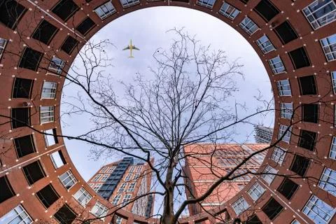 Autumn view of a circular bricks made resident building at the "Clio" place i Foto stock
